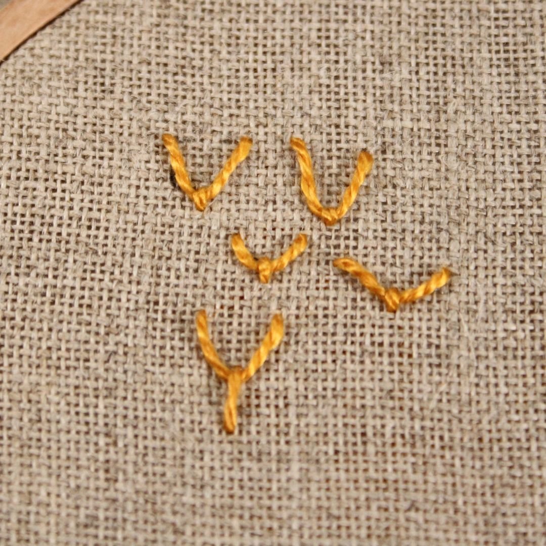 varying shapes of fly stitches