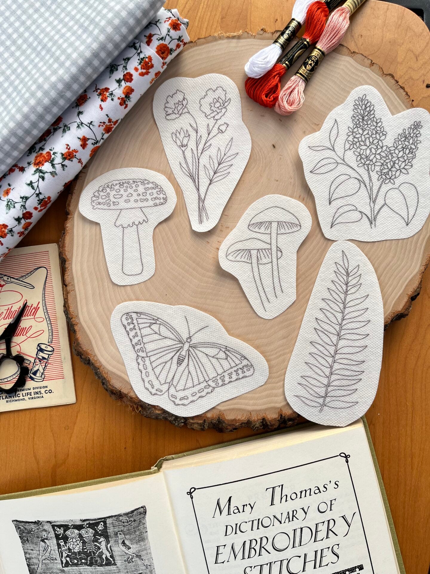 6 nature themed stick and stitch designs: wildflowers, mushrooms, a fern, and a butterfly