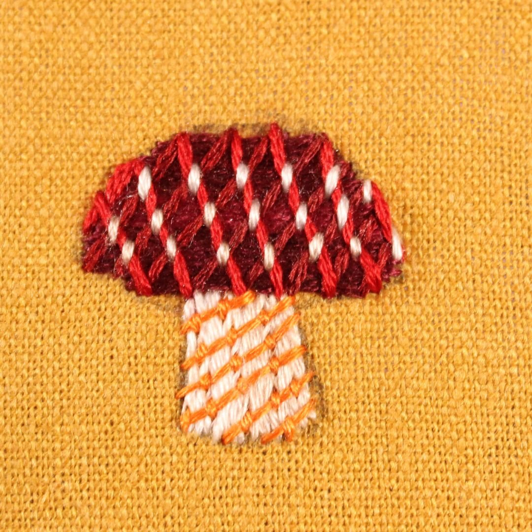 how to embroider a mushroom with laid work diagonal bars step 4