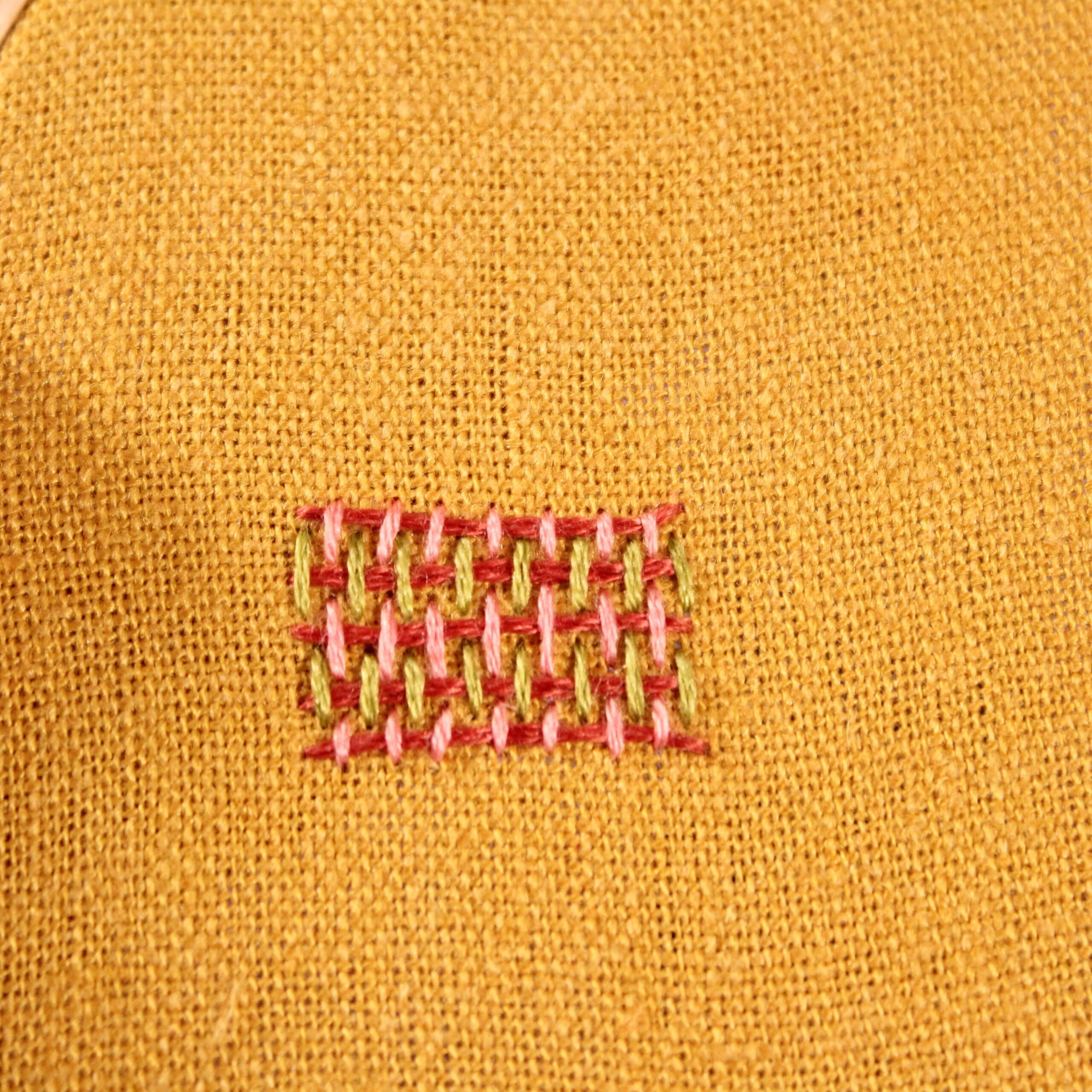 square filled in using the burden stitch