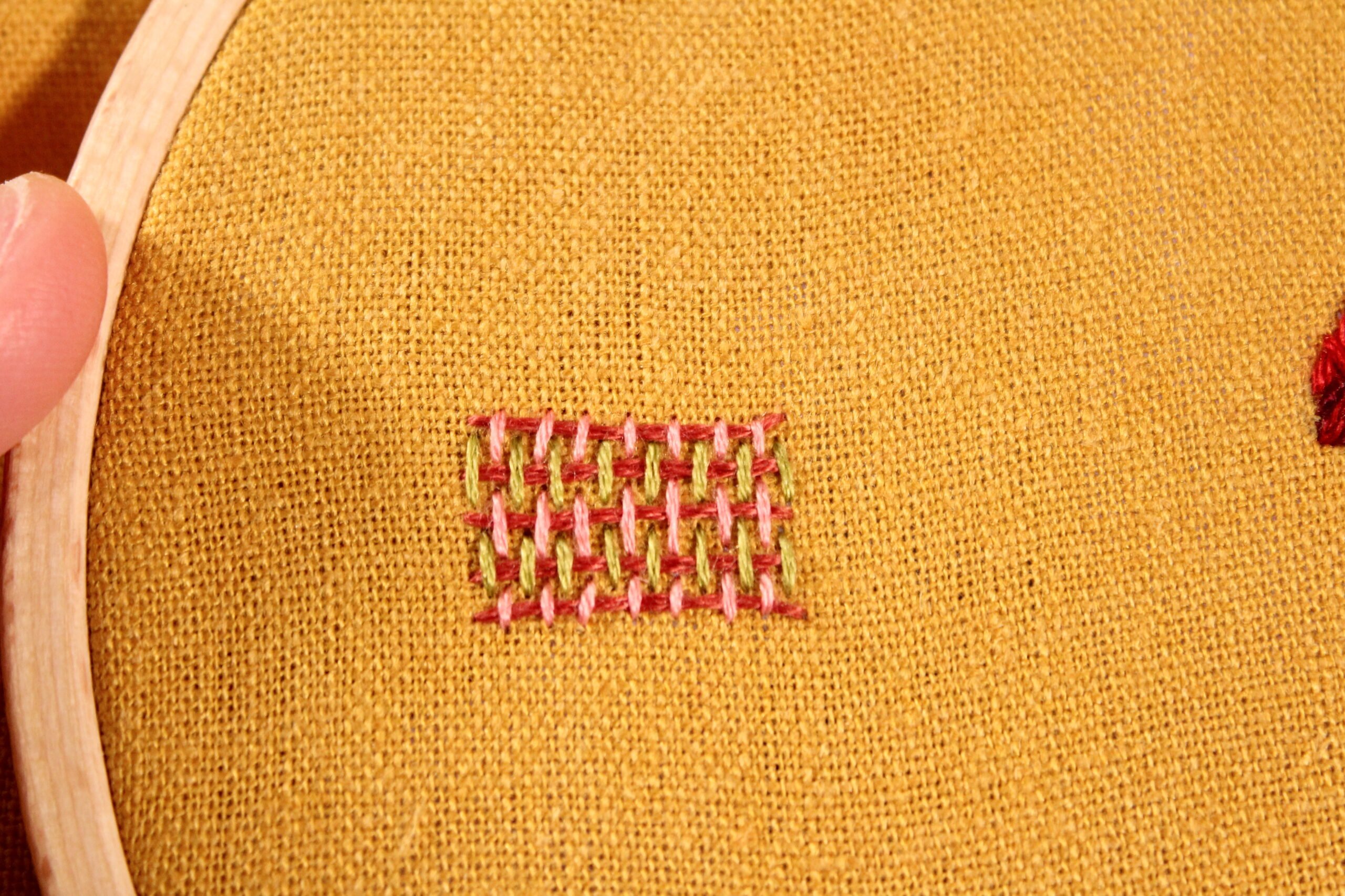 square filled in using the burden stitch