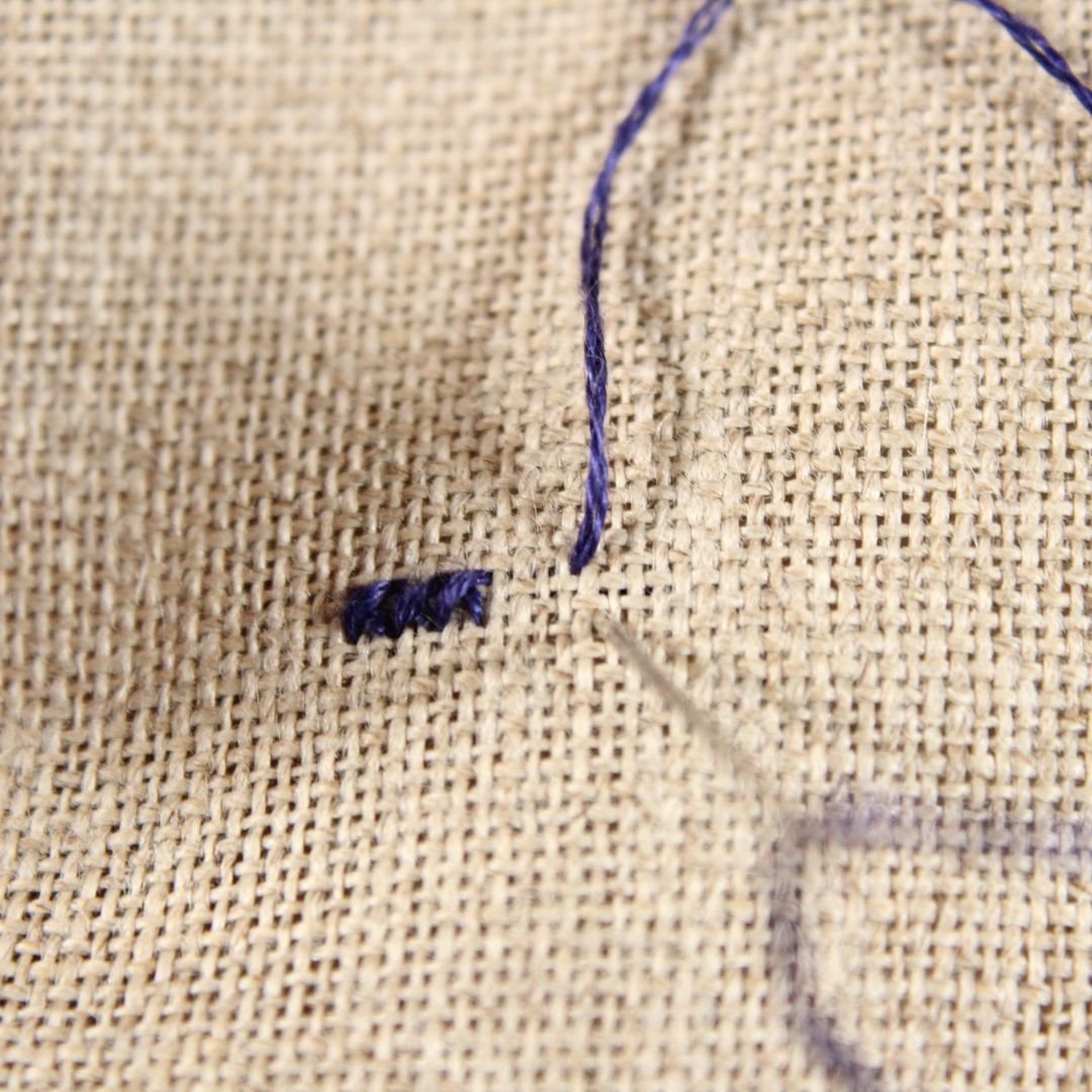 how to make a vertical half stitch on linen step 1