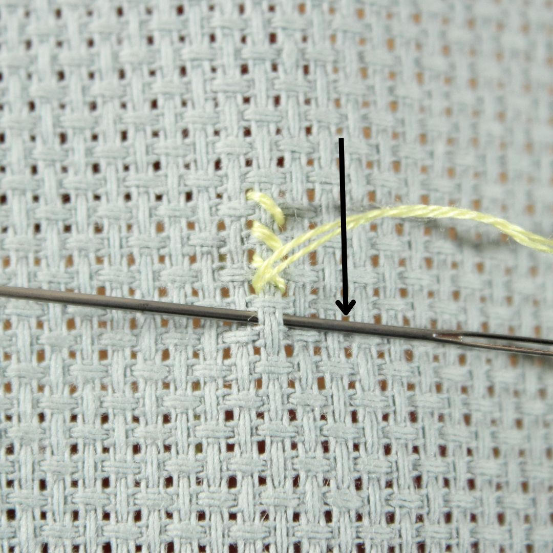 sewing vertical column of cross stitches step 2